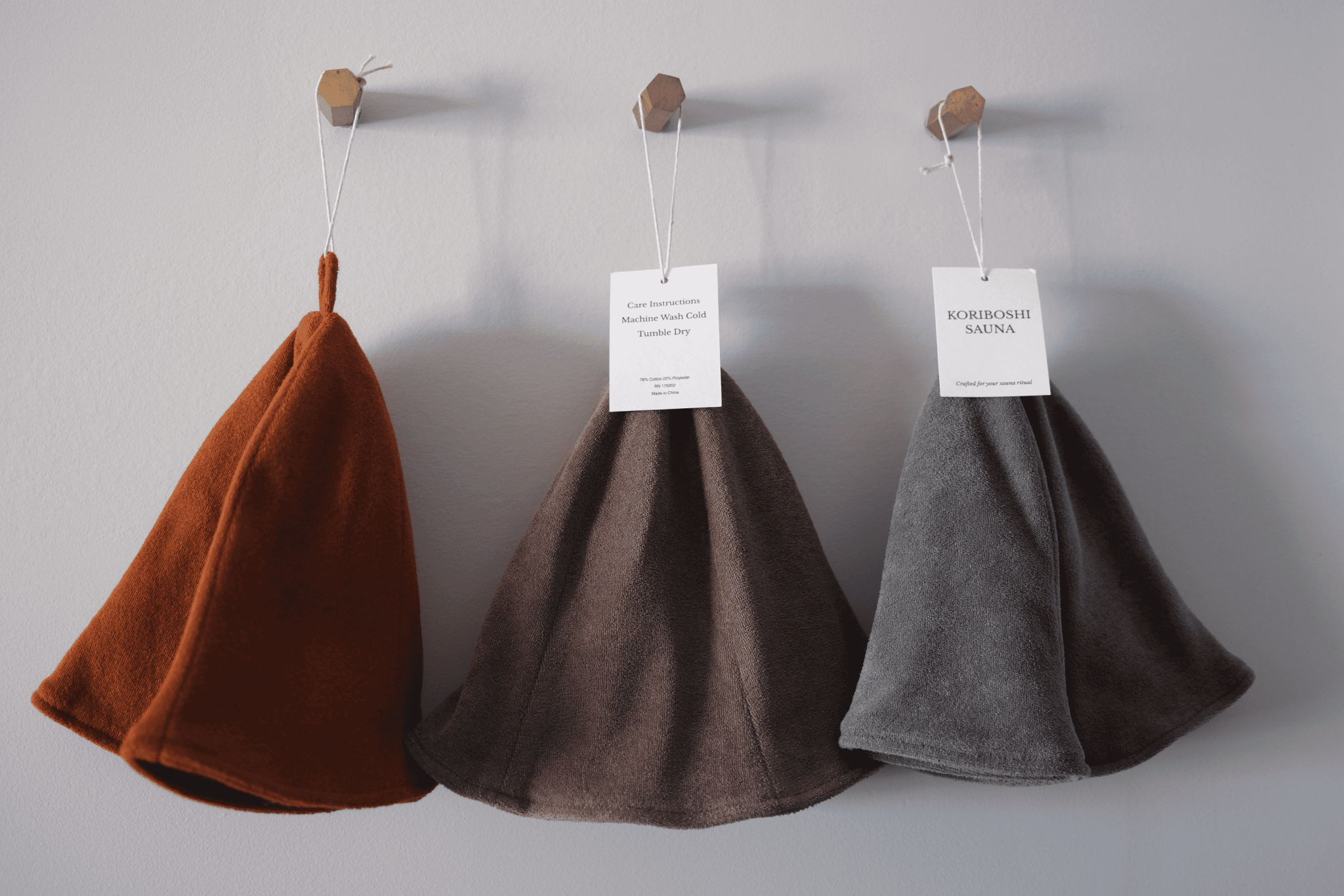 Three Sauna hats hanging up