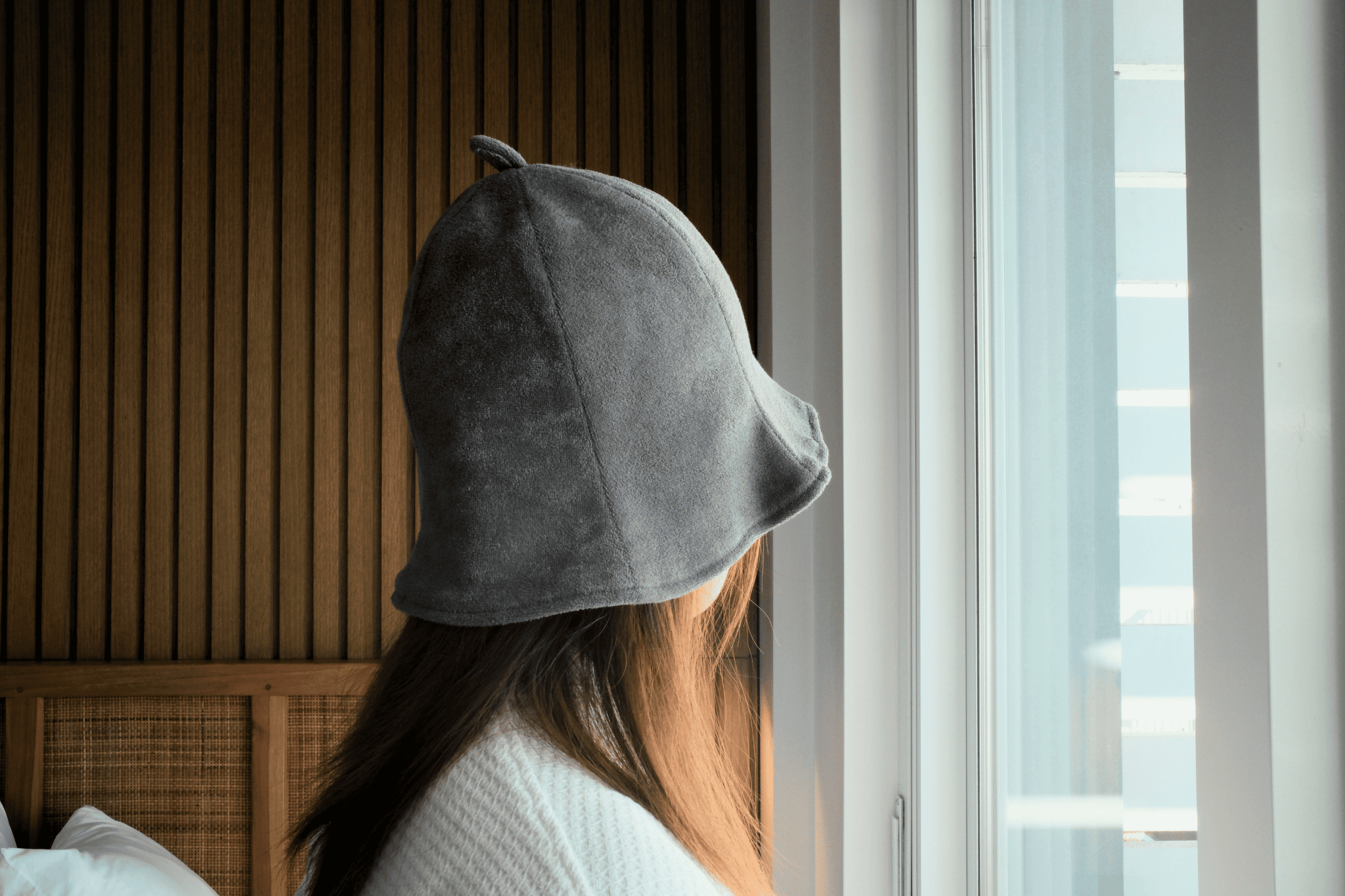 Women wearing sauna hat showing the back